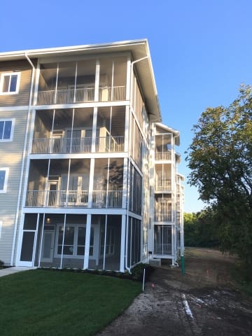 Lenoir Woods Senior Living west side of building screen porches insect control with door